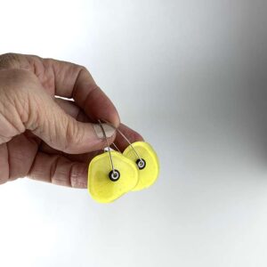 Bright yellow recycled glass earring with a yellow tint