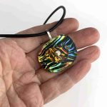 Dichroic Pendant Necklace with Rainbow glass in hand