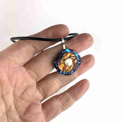 Dichroic stacked Pendant in Blue and Orange in hand