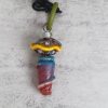 Pendant necklace with glass and shrink plastic