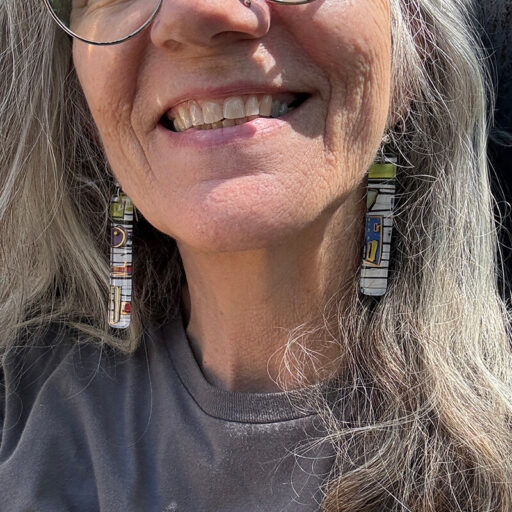 long fused abstract design earrings with 23Kt gold accents