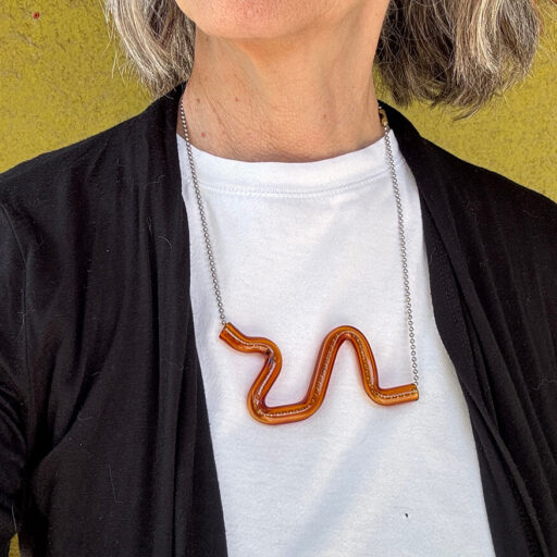 Model wearing the serpent wiggle