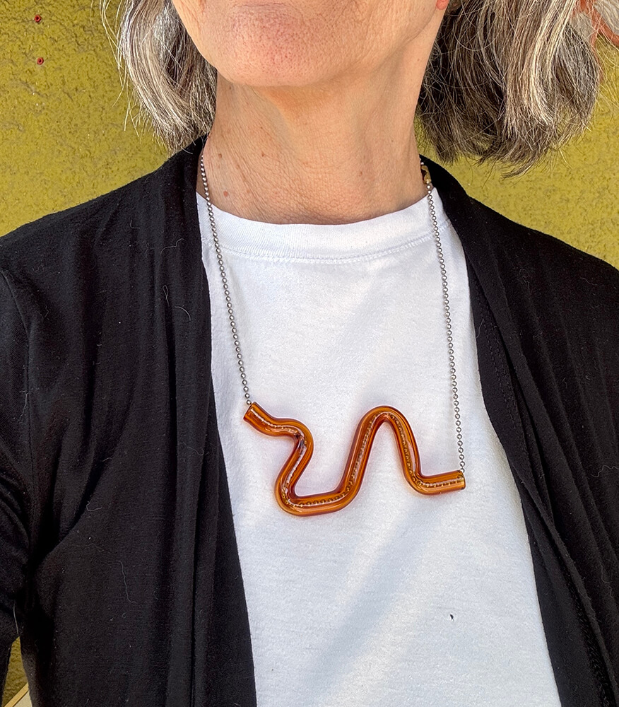 Model wearing the serpent wiggle