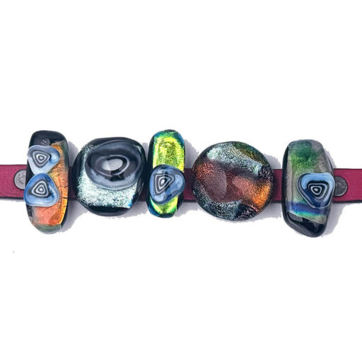 Dichroic sliders on a leather band