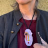 Cast and sculptured face bolo tie