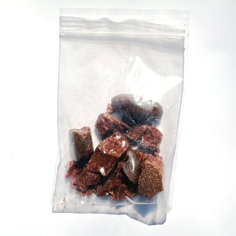 Red Goldstone assorted pieces in bag