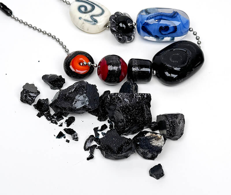 Black goldstone with beads