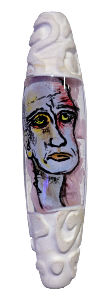 Reverse painted bead with heavily carved ivory ends